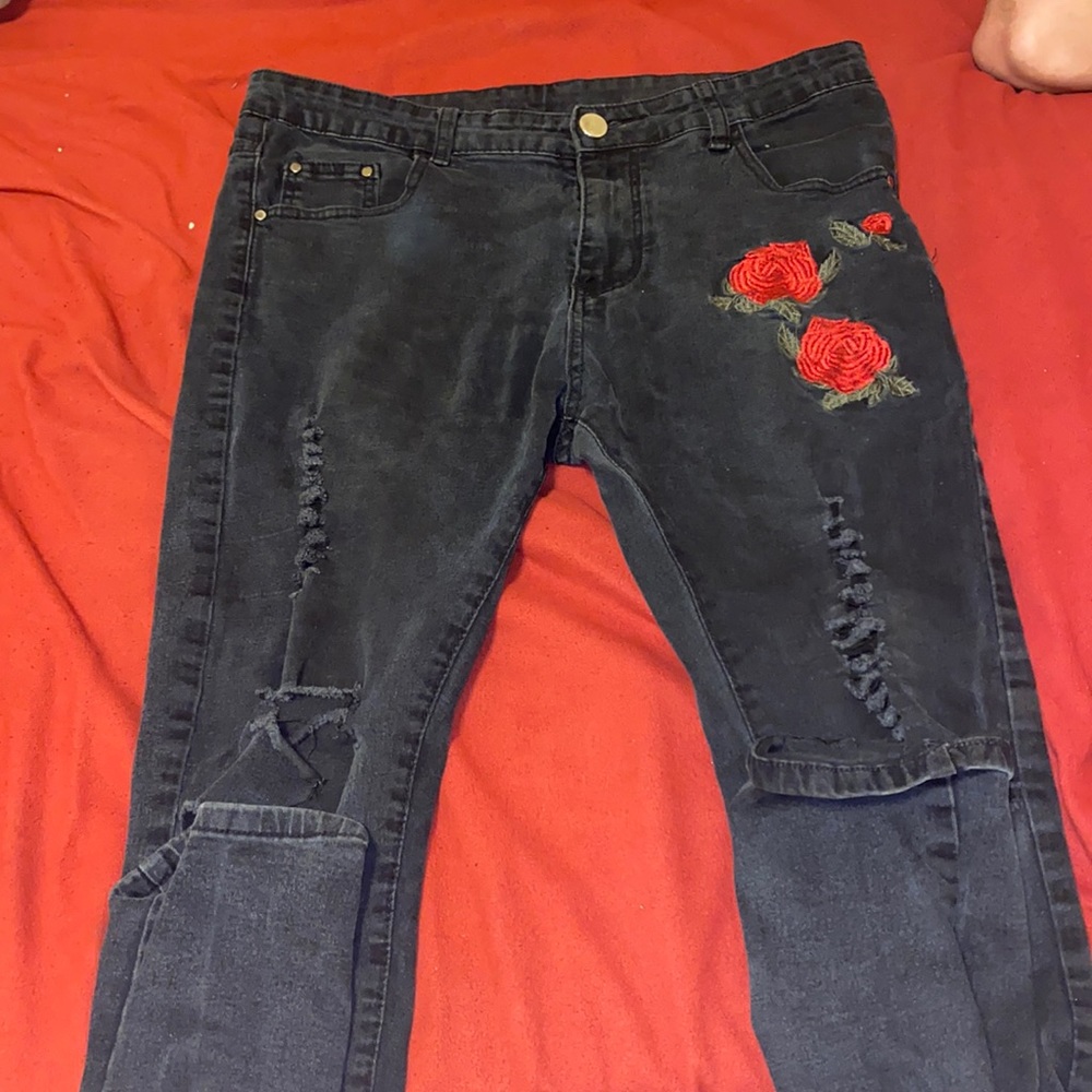 Men’s black ripped rose jeans
